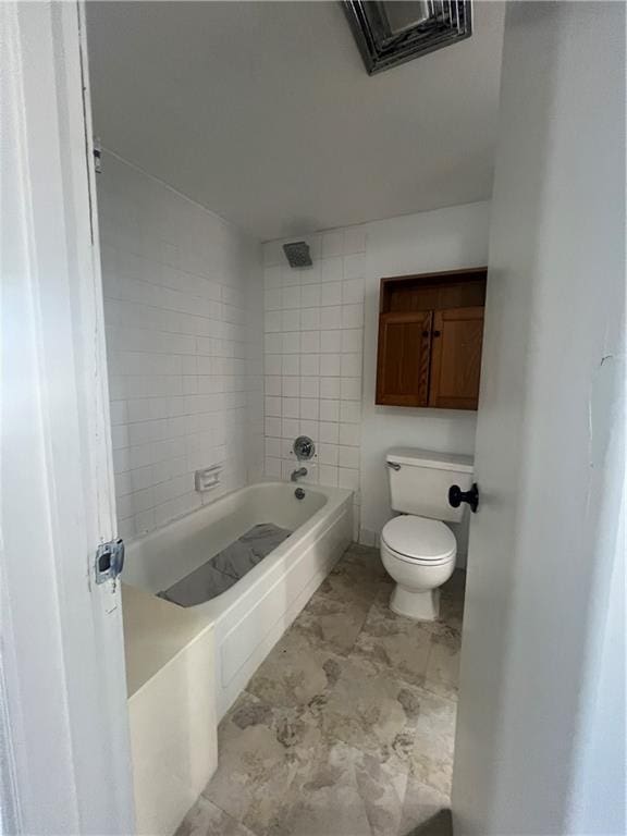 full bath with  shower combination, toilet, and visible vents