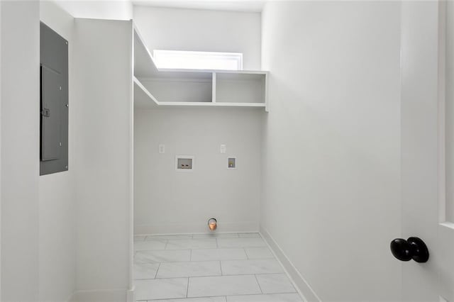 washroom featuring washer hookup, marble finish floor, laundry area, electric panel, and baseboards