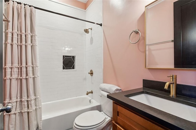 full bathroom with vanity, toilet, and shower / bath combo