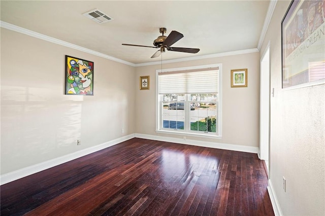 empty room featuring baseboards, visible vents, a ceiling fan, hardwood / wood-style flooring, and ornamental molding