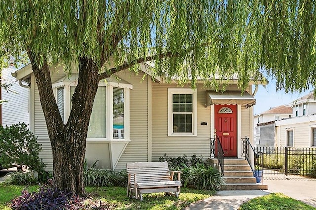 view of front of property with fence