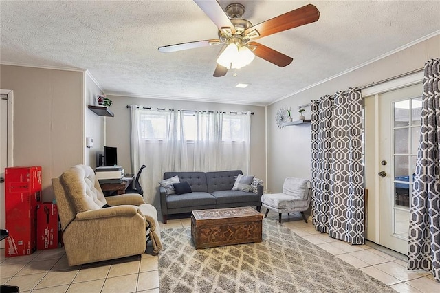 tiled living room with ornamental molding, a textured ceiling, and a ceiling fan