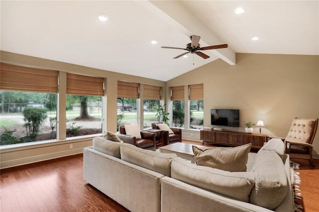 living room featuring lofted ceiling with beams, ceiling fan, recessed lighting, wood finished floors, and baseboards