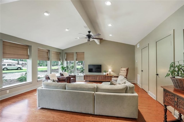 living room featuring vaulted ceiling with beams, recessed lighting, wood finished floors, and baseboards