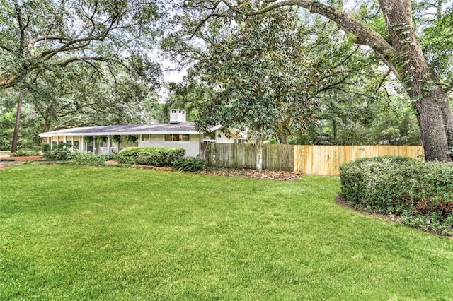 view of yard featuring fence