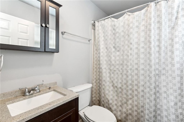 3030 Ridgeway Blvd, New Orleans, LA 70129 - bathroom with curtained shower, toilet, and vanity