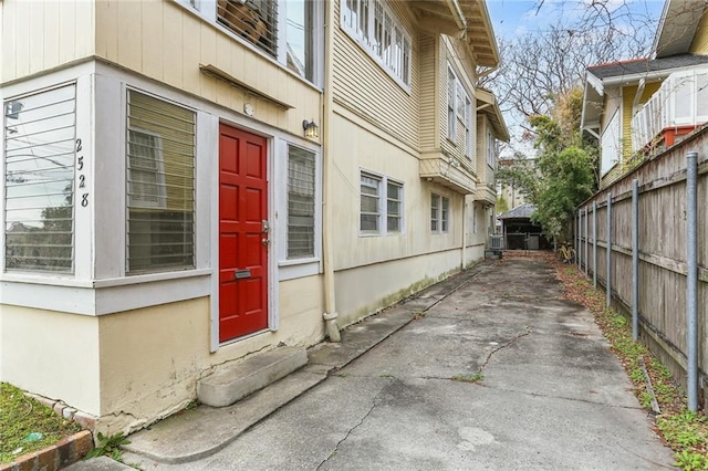 property entrance featuring fence