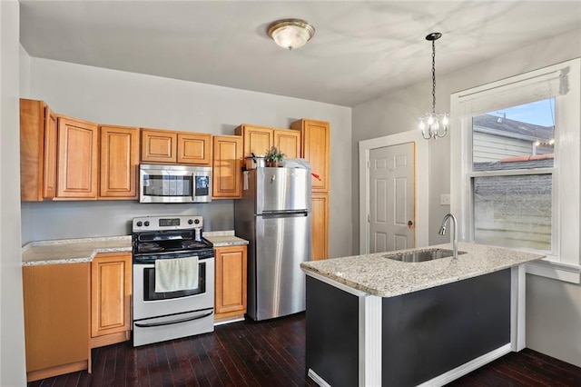632 S Solomon St, New Orleans, LA 70119 - kitchen featuring a sink, appliances with stainless steel finishes, light stone countertops, dark wood-style floors, and pendant lighting