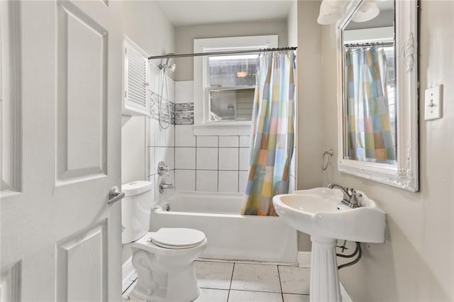 632 S Solomon St, New Orleans, LA 70119 - bathroom featuring shower / bath combination with curtain and toilet