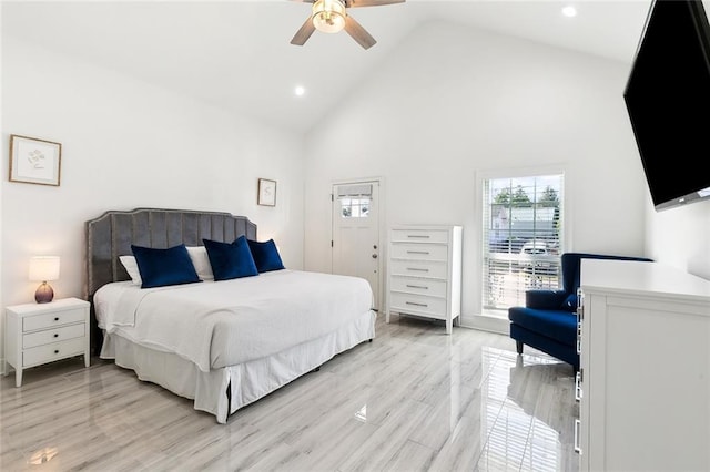 bedroom featuring ceiling fan, high vaulted ceiling, light wood-style flooring, and recessed lighting