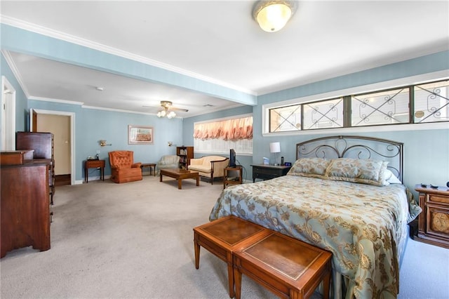 bedroom featuring baseboards, carpet, and crown molding