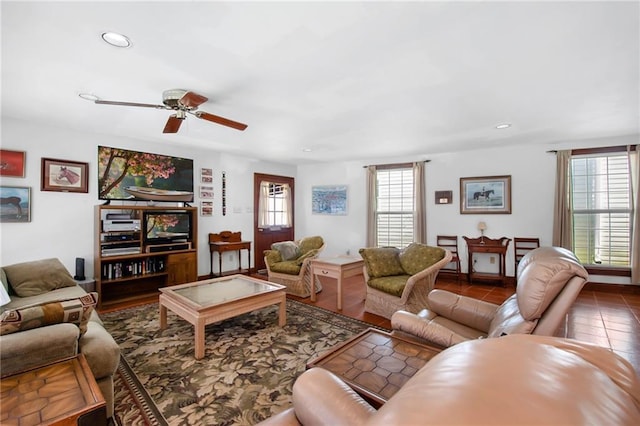 living area featuring a ceiling fan, recessed lighting, and a healthy amount of sunlight