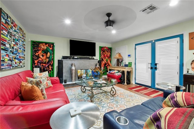 living room featuring visible vents, recessed lighting, ceiling fan, and wood finished floors