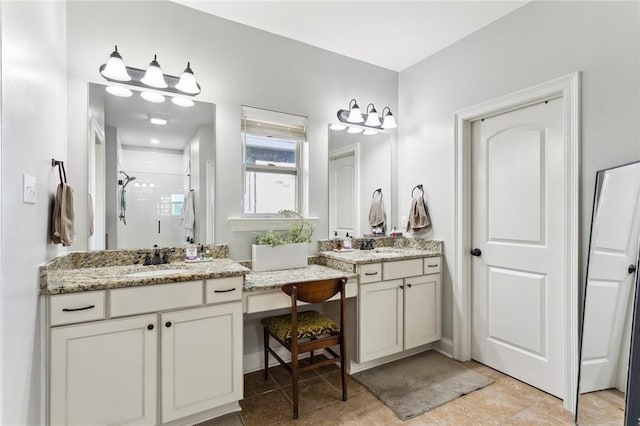 full bathroom with vanity and a stall shower