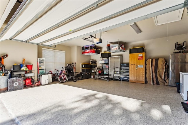 garage featuring freestanding refrigerator