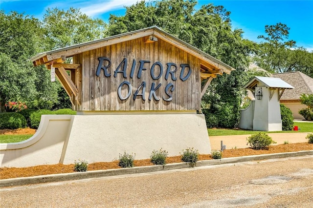 view of community sign