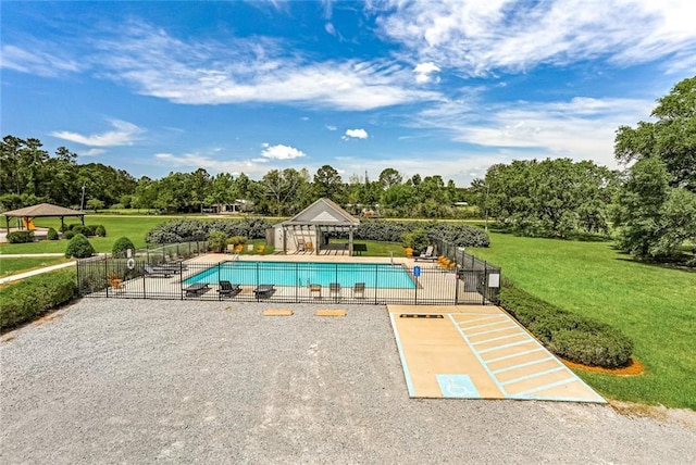 view of swimming pool featuring a fenced in pool, fence, a gazebo, a yard, and a patio