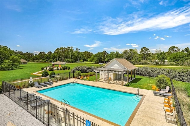 pool with fence, a gazebo, a yard, a pergola, and a patio