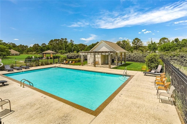 community pool with a patio, fence, and a pergola