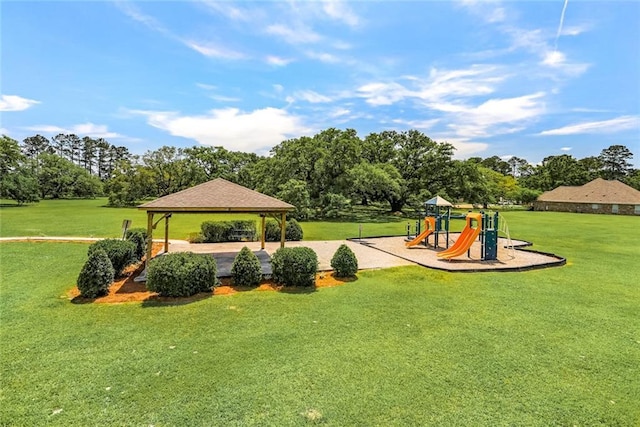 communal playground featuring a gazebo and a yard