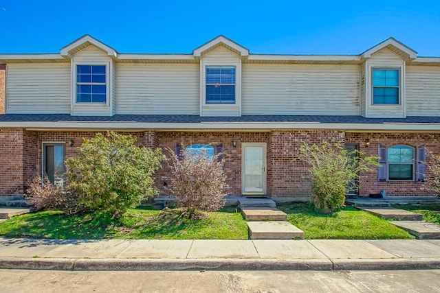 multi unit property featuring brick siding