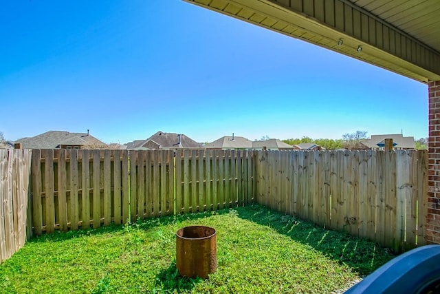 view of yard featuring a fenced backyard