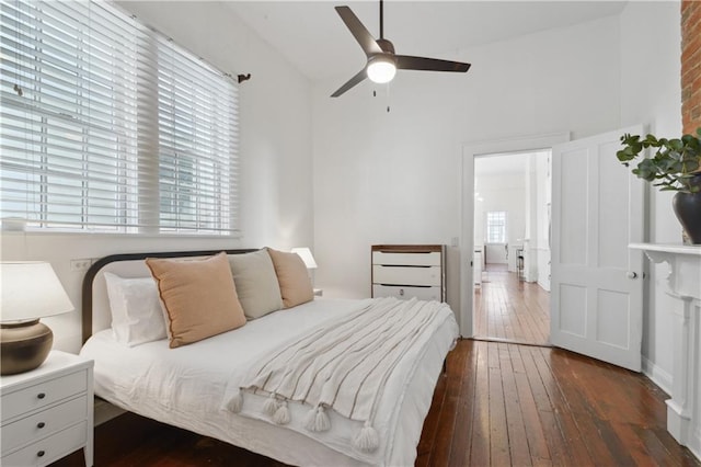 bedroom featuring hardwood / wood-style floors and ceiling fan