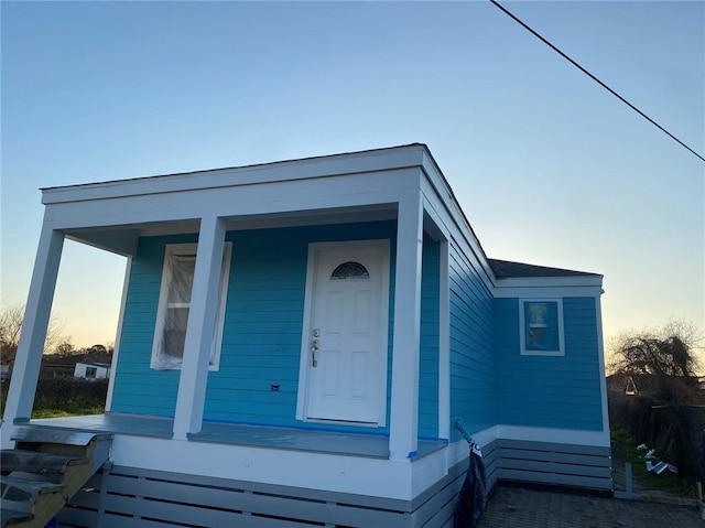 exterior space featuring covered porch