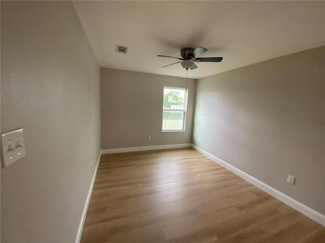 4612 Majestic Oaks Dr, New Orleans, LA 70126 - unfurnished room featuring visible vents, ceiling fan, light wood finished floors, and baseboards
