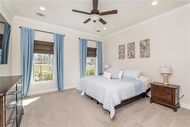 bedroom featuring baseboards, visible vents, recessed lighting, ornamental molding, and light carpet