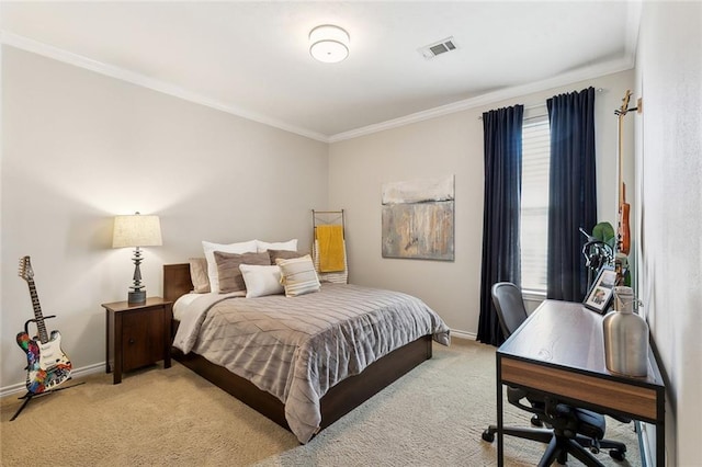 bedroom featuring crown molding, baseboards, visible vents, and carpet floors