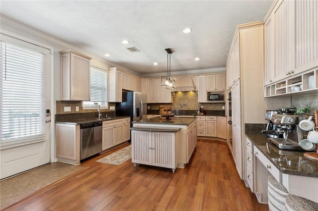 kitchen featuring backsplash, stainless steel appliances, and dark wood-type flooring