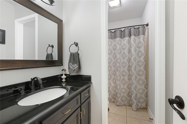 full bath with vanity, tile patterned floors, and a shower with curtain