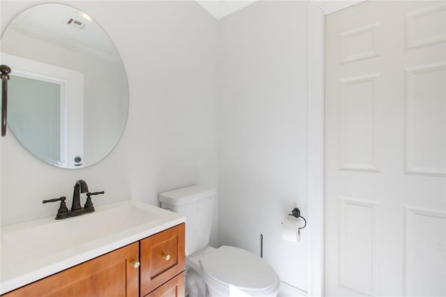 half bath with toilet and vanity