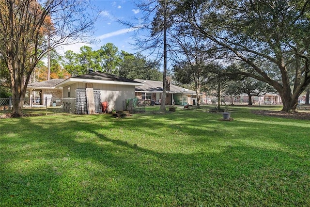 view of yard featuring fence