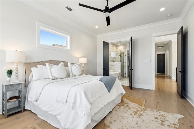 bedroom featuring visible vents, light wood-style flooring, baseboards, and ornamental molding