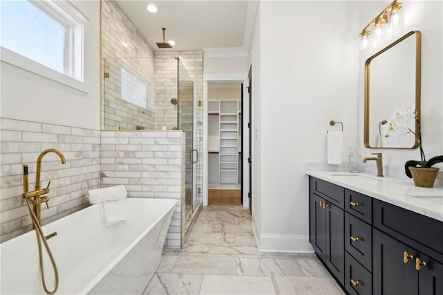 full bathroom with marble finish floor, a stall shower, a sink, double vanity, and a soaking tub