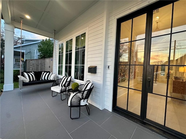 view of patio featuring covered porch