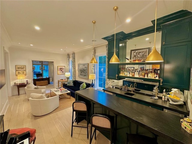 bar with crown molding, decorative light fixtures, indoor wet bar, recessed lighting, and light wood-style floors