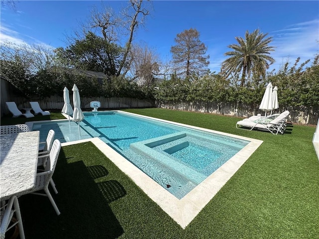 view of swimming pool with a fenced backyard, a patio area, a fenced in pool, and a yard