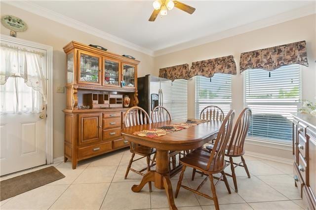 3408 Debouchel Blvd, Meraux, LA 70075 - dining room featuring ceiling fan, light tile patterned flooring, and ornamental molding