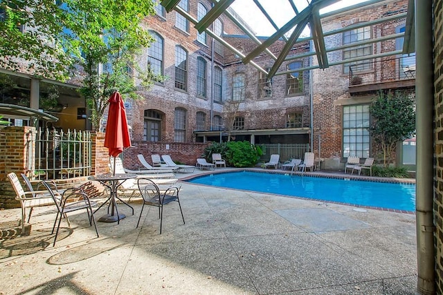 pool with a patio area