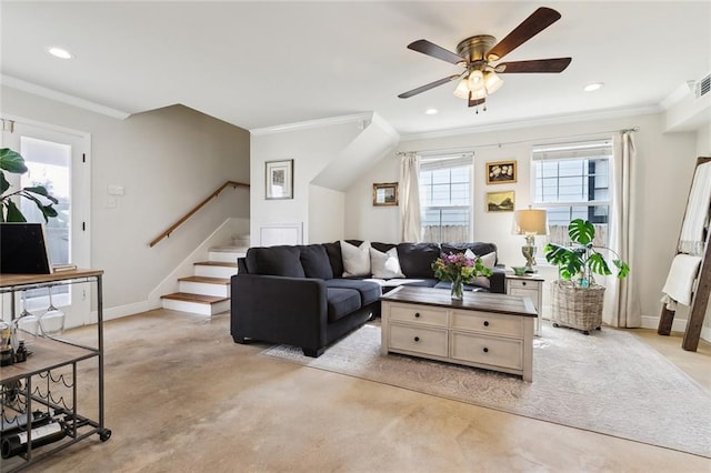 living room with stairway, visible vents, baseboards, and ornamental molding