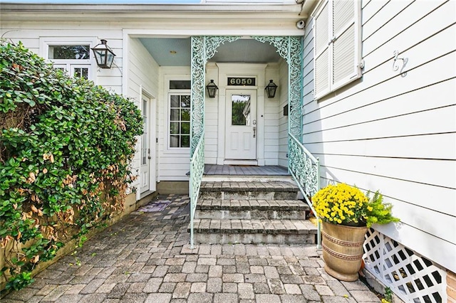 entrance to property with covered porch