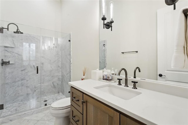 full bath with vanity, toilet, marble finish floor, and a marble finish shower