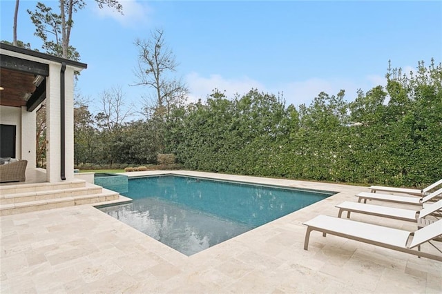 pool with a patio area