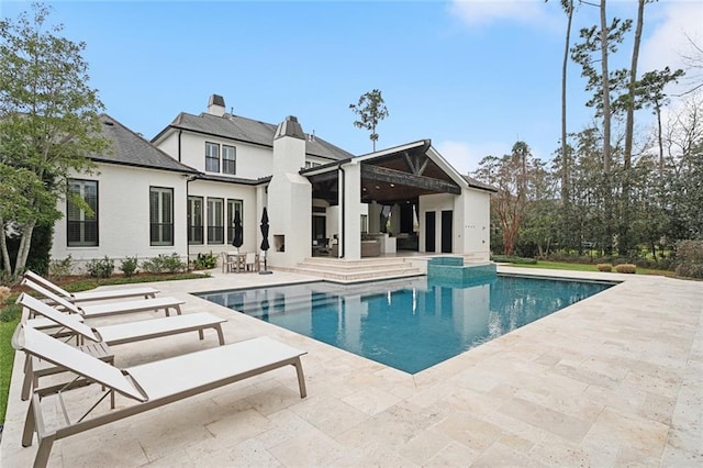 pool featuring a patio area