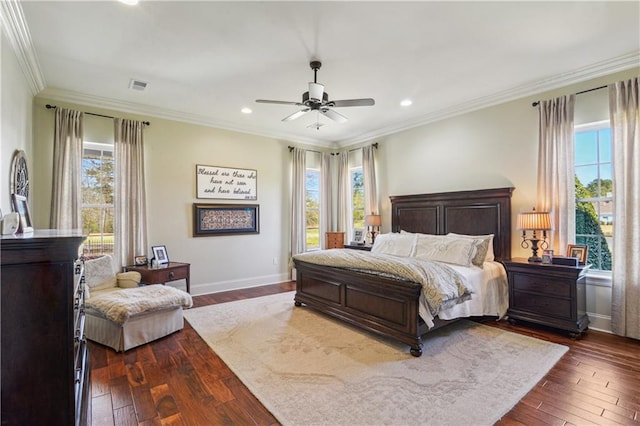 bedroom featuring crown molding, multiple windows, visible vents, and dark wood-style flooring