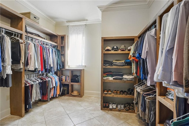 walk in closet with tile patterned flooring