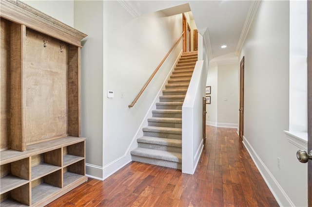 interior space with dark wood-style floors, recessed lighting, crown molding, and baseboards